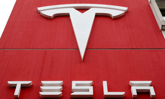 The logo of car manufacturer Tesla is seen at a branch office in Bern, Switzerland on Oct. 28, 2020. (Arnd Wiegmann/Reuters)