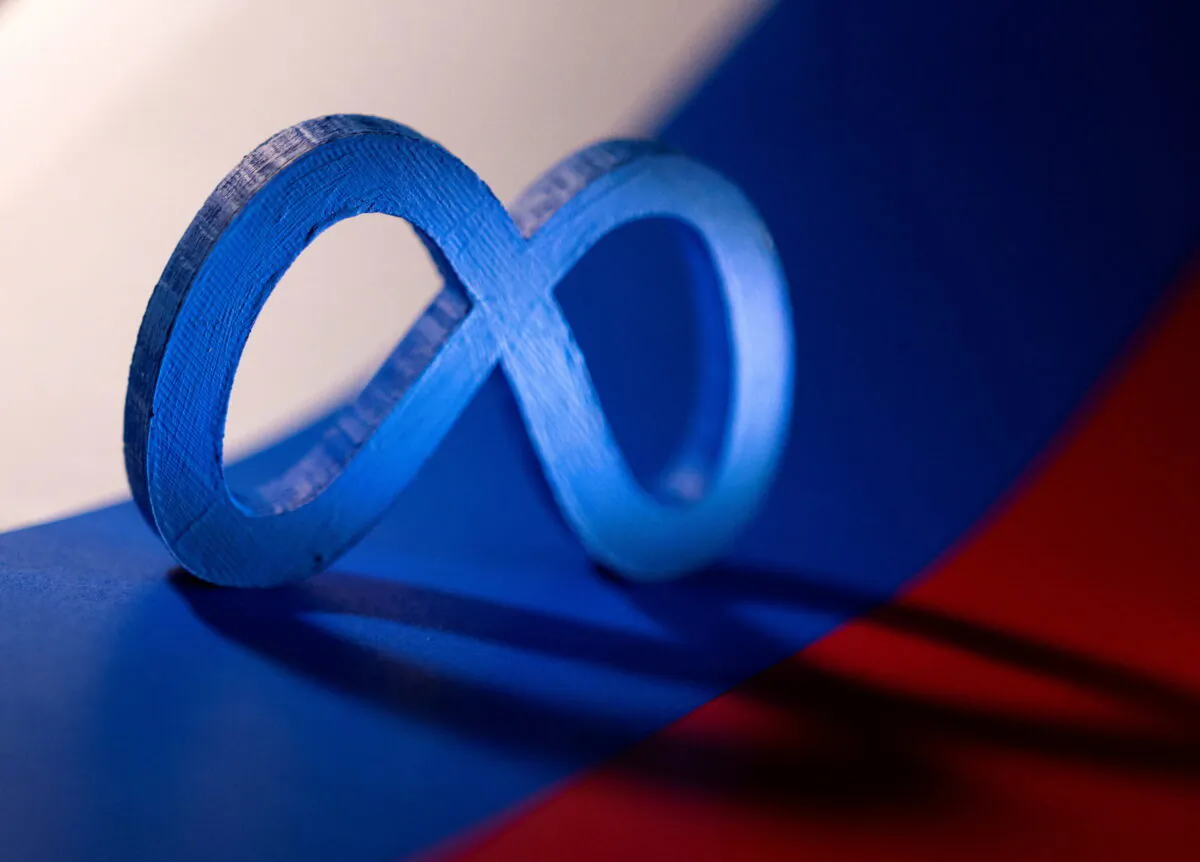 Meta logo is placed on a Russian flag in this illustration taken on Feb. 26, 2022. (Dado Ruvic/Reuters)