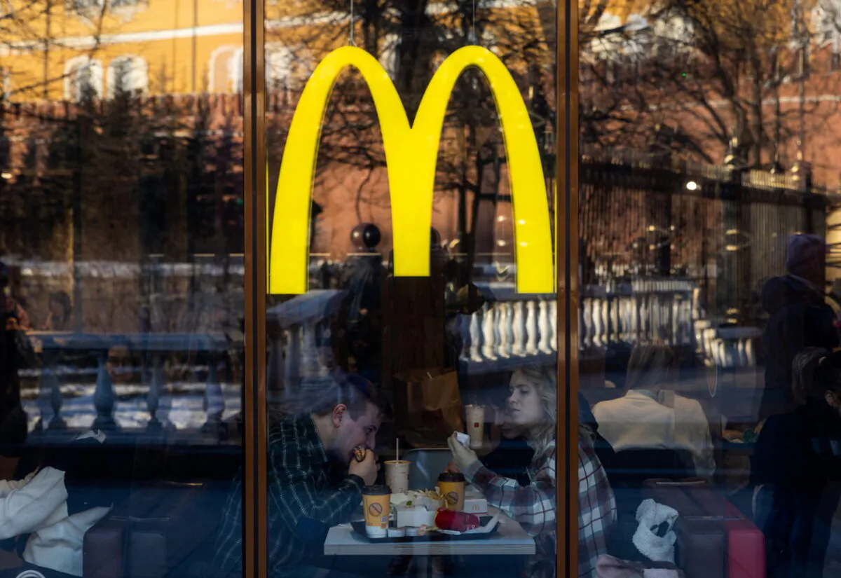 People eat in a McDonald's restaurant near Kremlin in central Moscow, on March 9, 2022. (Maxim Shemetov/Reuters)