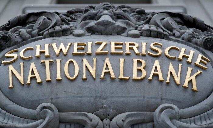 The Swiss National Bank (SNB) logo on its building in Bern, Switzerland, on April 2, 2022. (Arnd Wiegmann/Reuters)