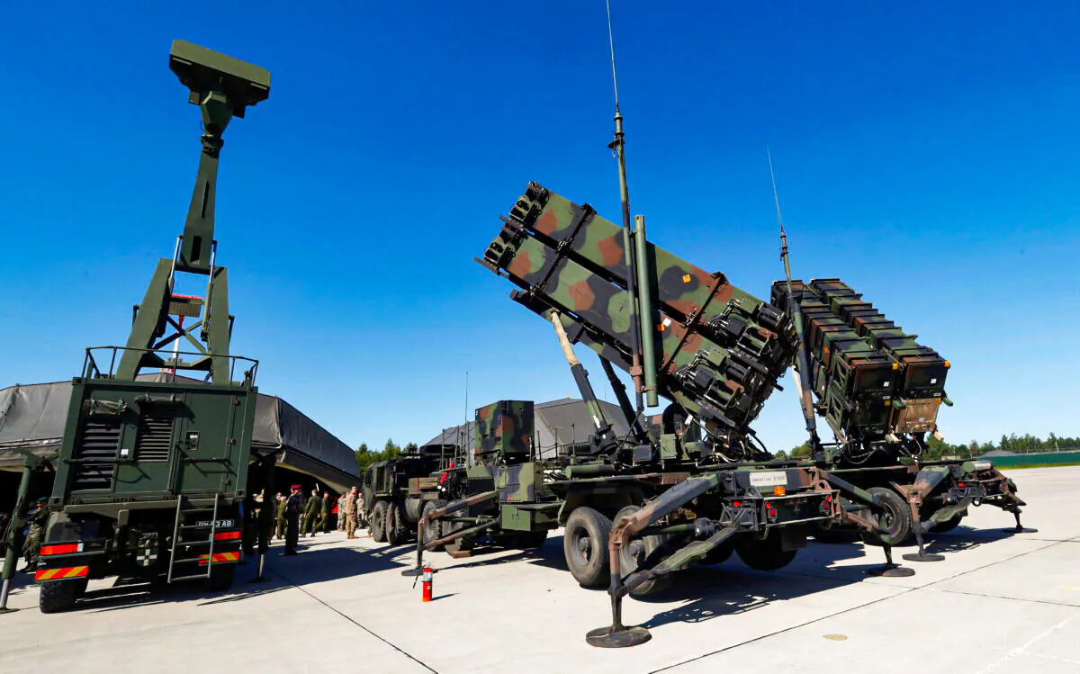 U.S. long range air defense systems Patriot (R) and British radar Giraffe AMB are displayed during Toburq Legacy 2017 air defence exercise in the military airfield near Siauliai, Lithuania, on July 20, 2017. (Ints Kalnins/Reuters)
