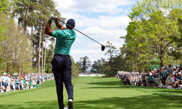 Tiger Woods plays his shot from the seventh tee during the second round of The Masters at Augusta National Golf Club, in Augusta, Ga., on April 8, 2022. (Gregory Shamus/Getty Images)