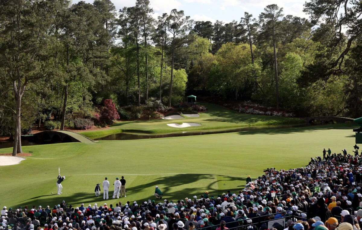 Scottie Scheffler plays his shot from the 12th tee during the third round of the Masters at Augusta National Golf Club, in Augusta, Georgia, on April 9, 2022. (Jamie Squire/Getty Images)