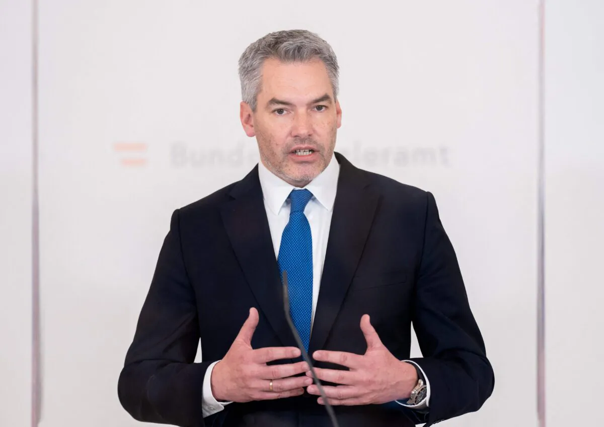 Austrian Chancellor Karl Nehammer gives a press statement on the situation in Ukraine after a meeting of the crisis cabinet in Vienna on Feb. 22, 2022. (Georg Hochmuth/APA/AFP via Getty Images)