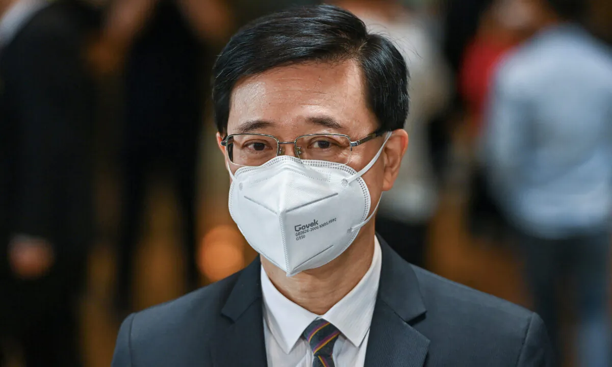 Hong Kong’s former No. 2 official John Lee, formally declared his candidacy for the upcoming leadership election, entering the race for chief executive on April 11, 2022. (Sung Pi-Lung/The Epoch Times)