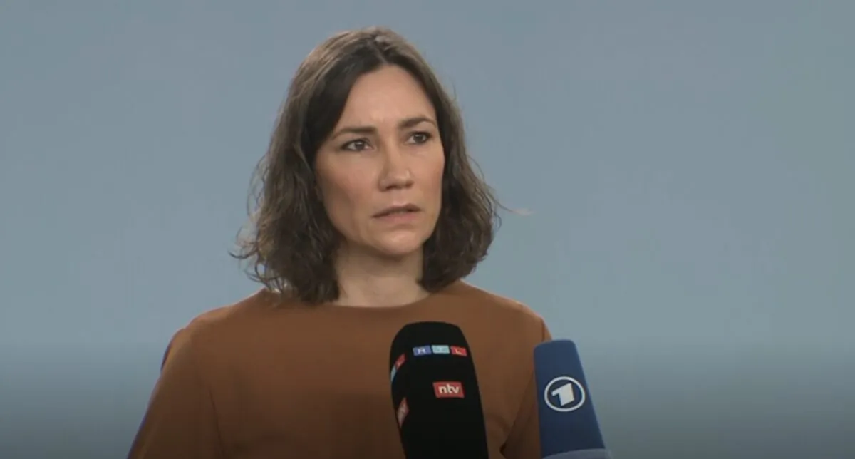 In this still taken from AP video, Anne Spiegel, former German minister for families and women is seen at a news conference in Berlin, on April 10, 2022. (AP/Screenshot via The Epoch Times)