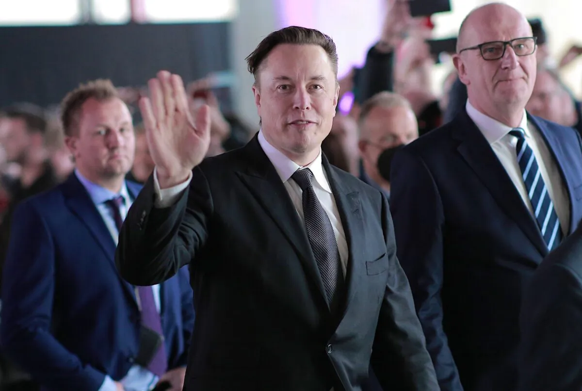 Tesla CEO Elon Musk (C) attends the official opening of the new Tesla electric car manufacturing plant near Gruenheide, Germany, on March 22, 2022. (Christian Marquardt/Pool/Getty Images)