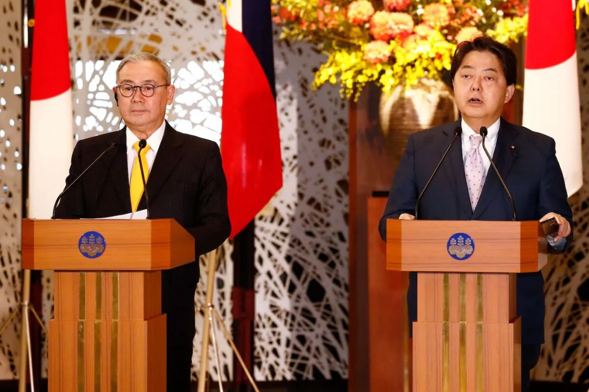 Philippines' Foreign Secretary Teodoro Locsin Jr. (L) attends a news conference with Japan's Foreign Minister Yoshimasa Hayashi (R) in Tokyo, on April 9, 2022. (Rodrigo Reyes Marin AFP via Getty Images)
