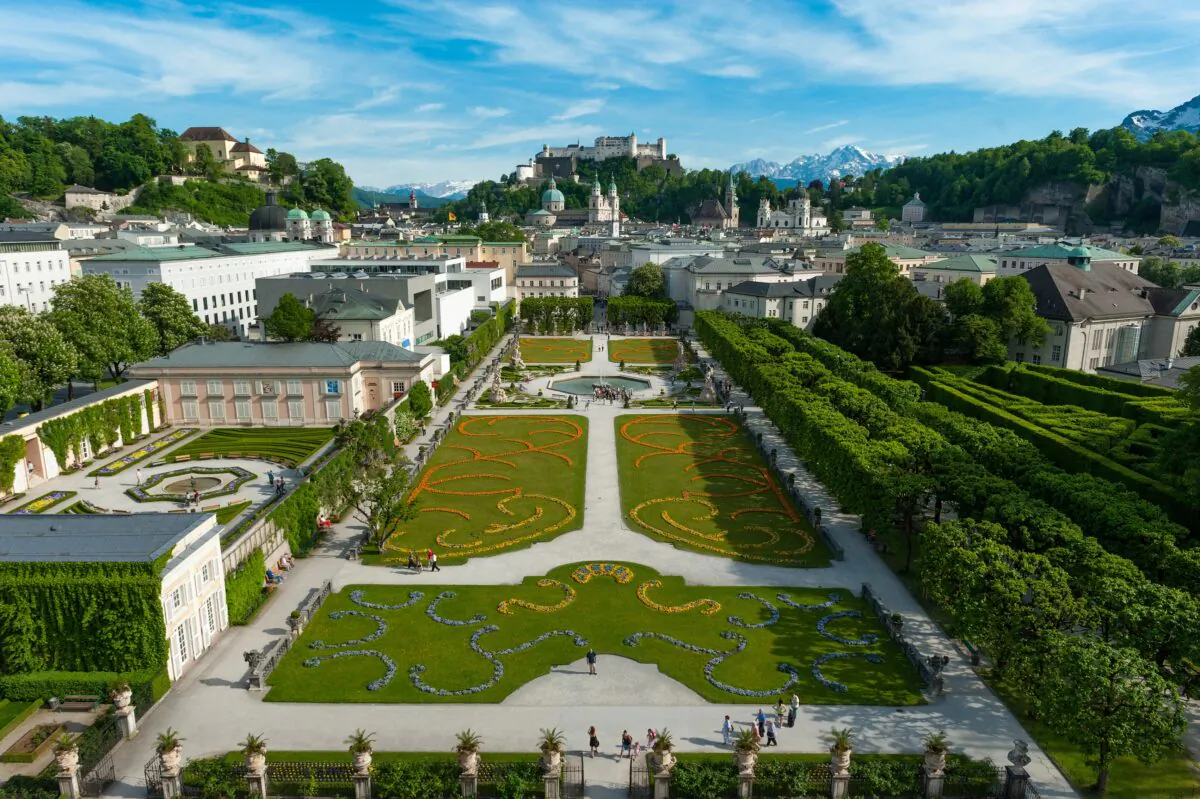A spectacular view of Salzburg, Austria from atop Mirabell Palace. Mirabell Gardens and the Grand Parterre lead the eye to the many historic buildings in “Old Town” Salzburg with the mighty Hohensalzburg Fortress perched above. (Courtesy of Salzburg Tourism/Photographer: Breitegger Günter)