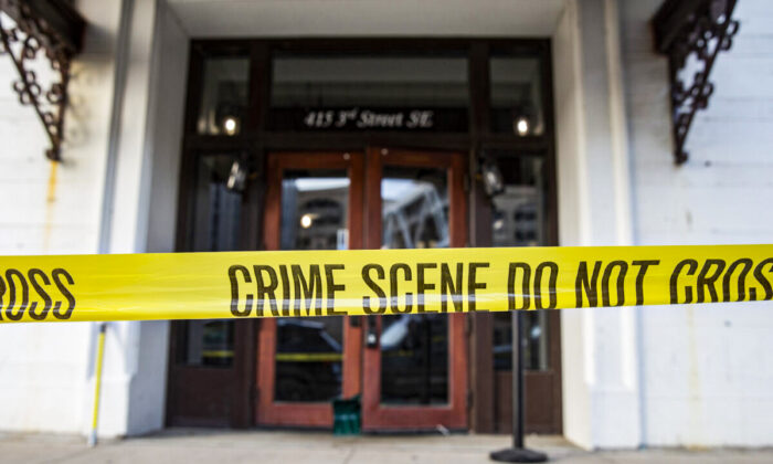 Crime scene tape blocks off the Taboo Nightclub and Lounge in Cedar Rapids, Iowa, on April 10, 2022. (Savannah Blake/The Gazette via AP)