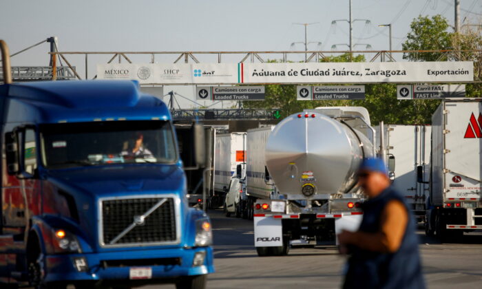 Trucks wait in a long queue to cross into the United States after the Texas Department of Public Safety announced increased security checks at the international ports of entry into Texas, at the Zaragoza-Ysleta border crossing bridge in Ciudad Juarez, Mexico, on April 9, 2022. (Jose Luis Gonzalez/Reuters)