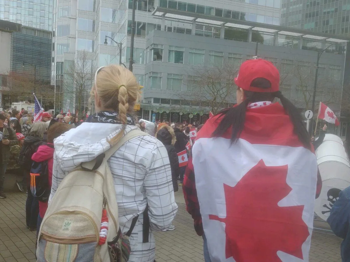 Protesters demonstrate outside the Vancouver Convention Centre where Vancouver’s annual Ted Talks takes place on April 10, 2022. (Jeff Sandes/The Epoch Times)