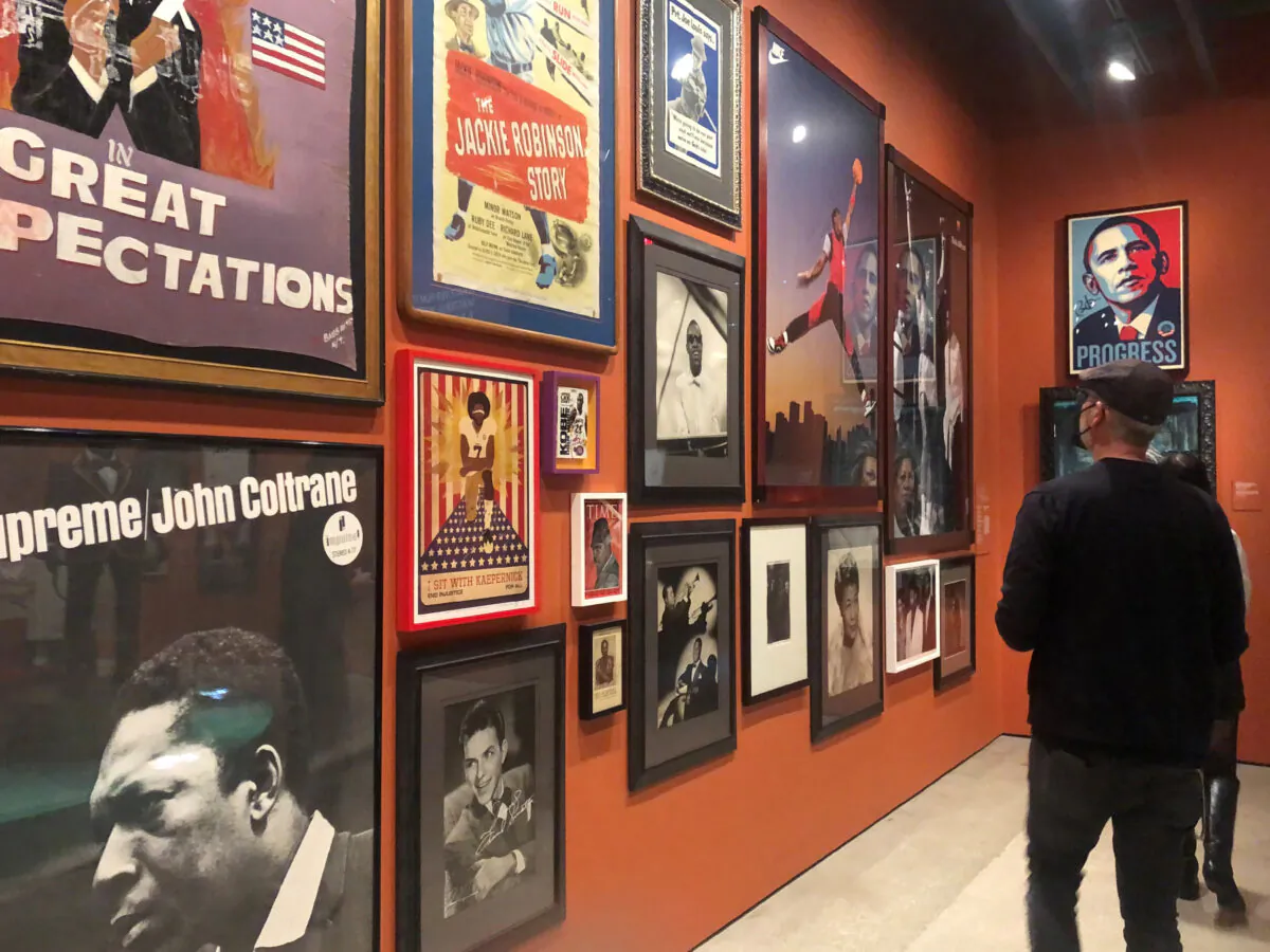 Visitors to the Academy Museum of Motion Pictures Arts and Sciences in Los Angeles, California, examine movie posters from Spike Lee's personal collection. (Photo courtesy of Bill Neely)