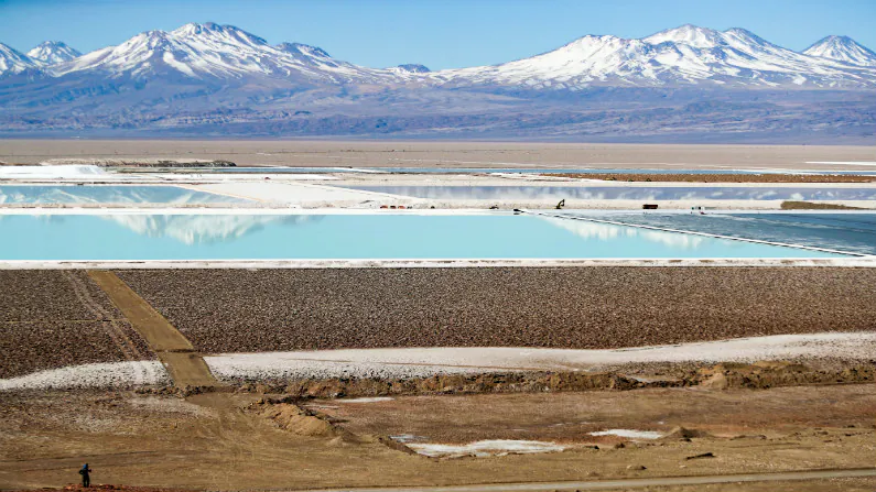 Brine pools from a lithium mine belonging to U.S.-based Albemarle Corporation, is seen on the Atacama salt flat in the Atacama desert in Chile, in 2018. (Ivan Alvarado/Reuters)