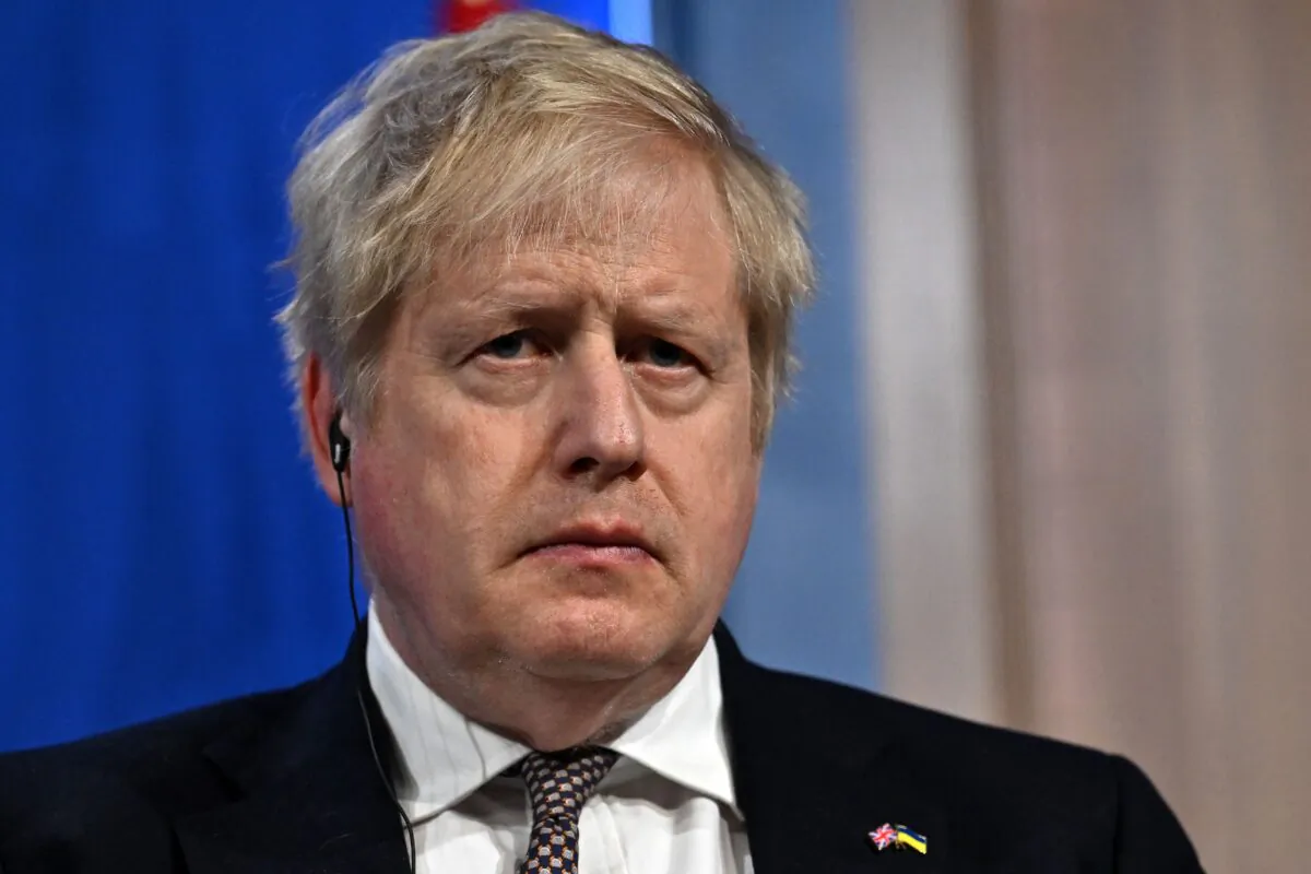 Britain's Prime Minister Boris Johnson attends a joint press conference with Germany's Chancellor Olaf Scholz inside the Downing Street briefing room following a bilateral meeting at 10 Downing Street in London on April 8, 2022. (Ben Stansall /Pool/AFP via Getty Images)