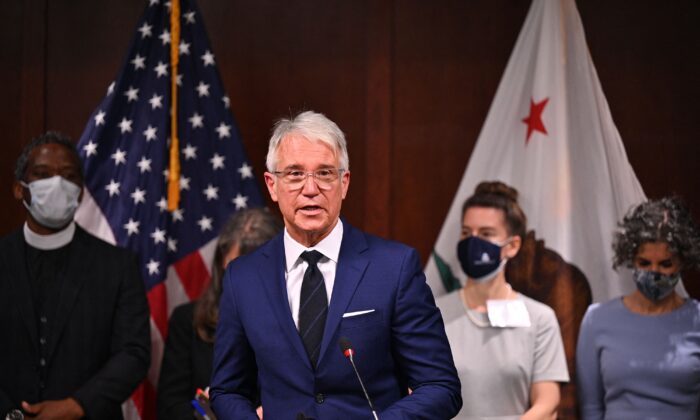 Los Angeles County District Attorney George Gascón speaks at a press conference in Los Angeles, on Dec. 8, 2021. (Robyn Beck/AFP via Getty Images)