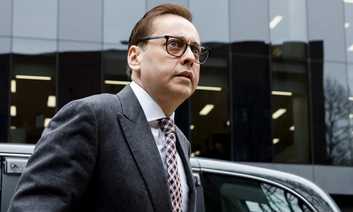 British lawmaker Imran Ahmad Khan arrives at Southwark Crown Court to stand trial over sex offence claims, in London, on April 8, 2022. (Peter Cziborra/Reuters)