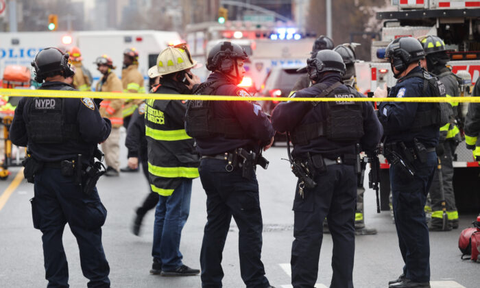 Police and emergency responders gather at the site of a reported shooting of multiple people outside of the 36 St subway station in the Brooklyn borough of New York City on April 12, 2022. (Spencer Platt/Getty Images)