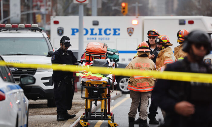 Police and emergency responders gather at the site of a reported shooting of multiple people outside of the 36 St subway station in the Brooklyn borough of New York on April 12, 2022. (Spencer Platt/Getty Images)