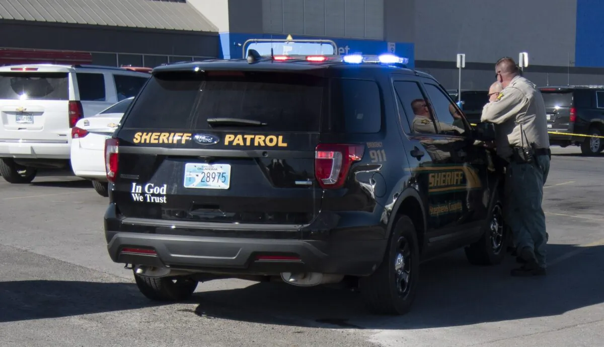 Police car in a parking lot in Duncan, Okla., on Nov. 18, 2019. (J Pat Carter/Getty Images)