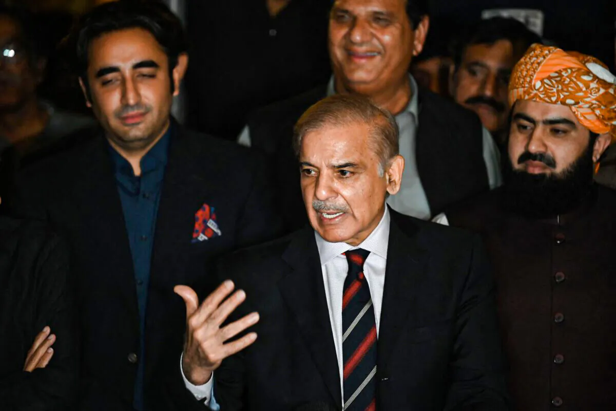 Pakistan's opposition leader Shahbaz Sharif (C) speaks, flanked by Bilawal Bhutto Zardari (L), during a press conference with other parties' leaders in Islamabad, Pakistan, on April 7, 2022. (Aamir Qureshi/AFP via Getty Images)