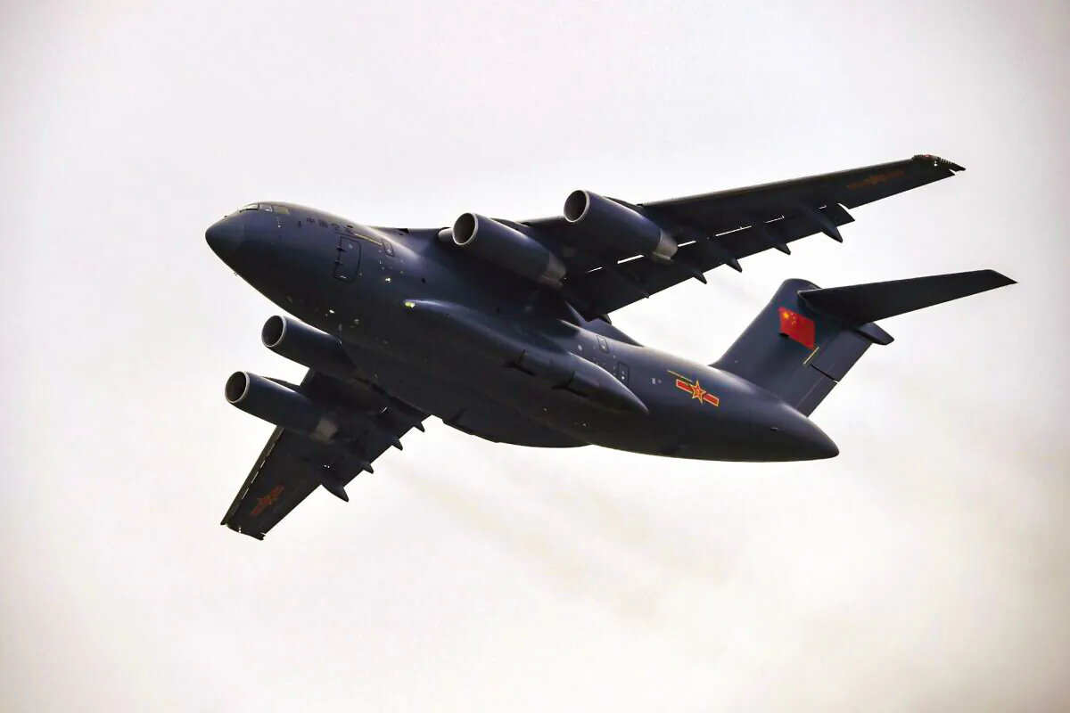 A Xian Y-20 heavy transport aircraft flies past during the Zhuhai Air Show in Zhuhai, southern China's Guangdong province on Nov. 1, 2016. (STR/AFP via Getty Images)