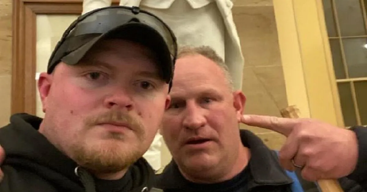 Jacob Fracker (L) and Thomas Robertson pose in the U.S. Capitol on Jan. 6, 2021. (DOJ via The Epoch Times)