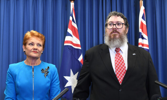 One Nation leader, Senator Pauline Hanson (L) is seen with her Senate candidates George Christensen (R) during a press conference in Brisbane, Australia, on April 13, 2022. (AAP Image/Darren England)