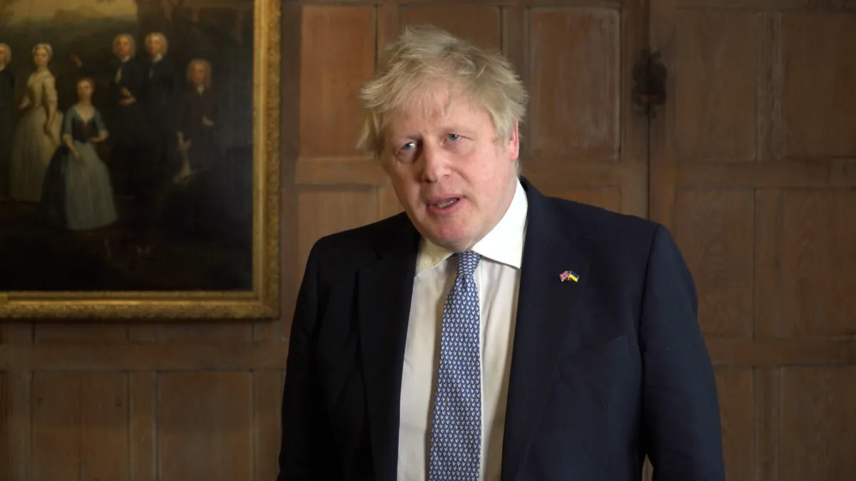 UK Prime Minister Boris Johnson delivers a statement following the announcement that he and Chancellor Rishi Sunak would be fined as part of a police probe into allegations of lockdown parties, at his country residence Chequers, in Buckinghamshire, England, on April 12, 2022. (Marc Ward/PA)