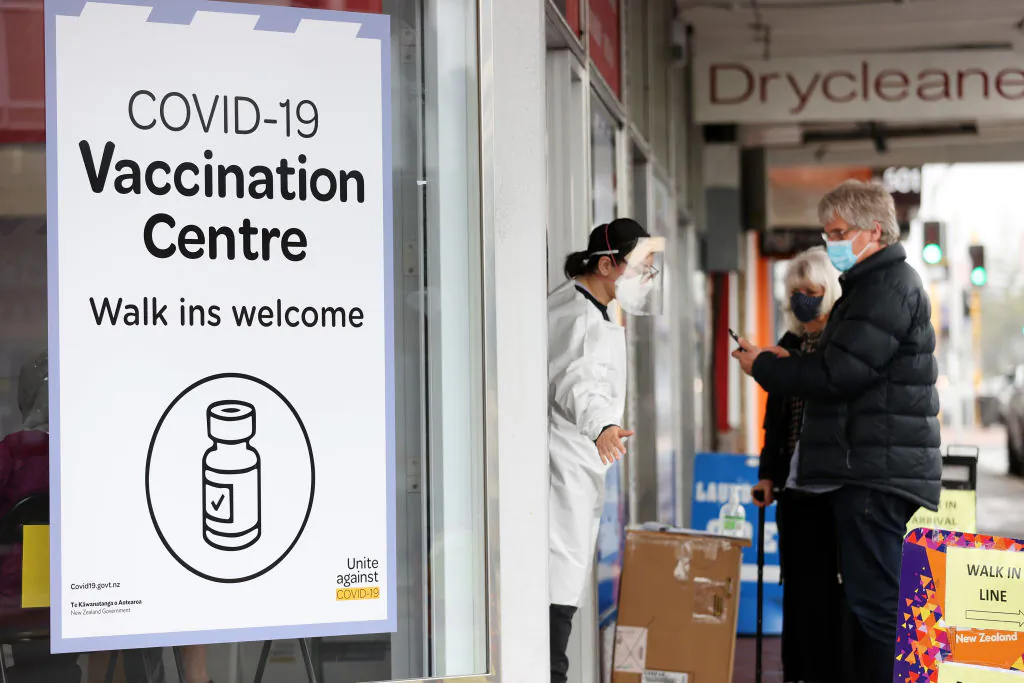 People walk up to a vaccination centre on Dominion Rd, Balmoral in Auckland, New Zealand, on Sept. 16, 2021. (Fiona Goodall/Getty Images)