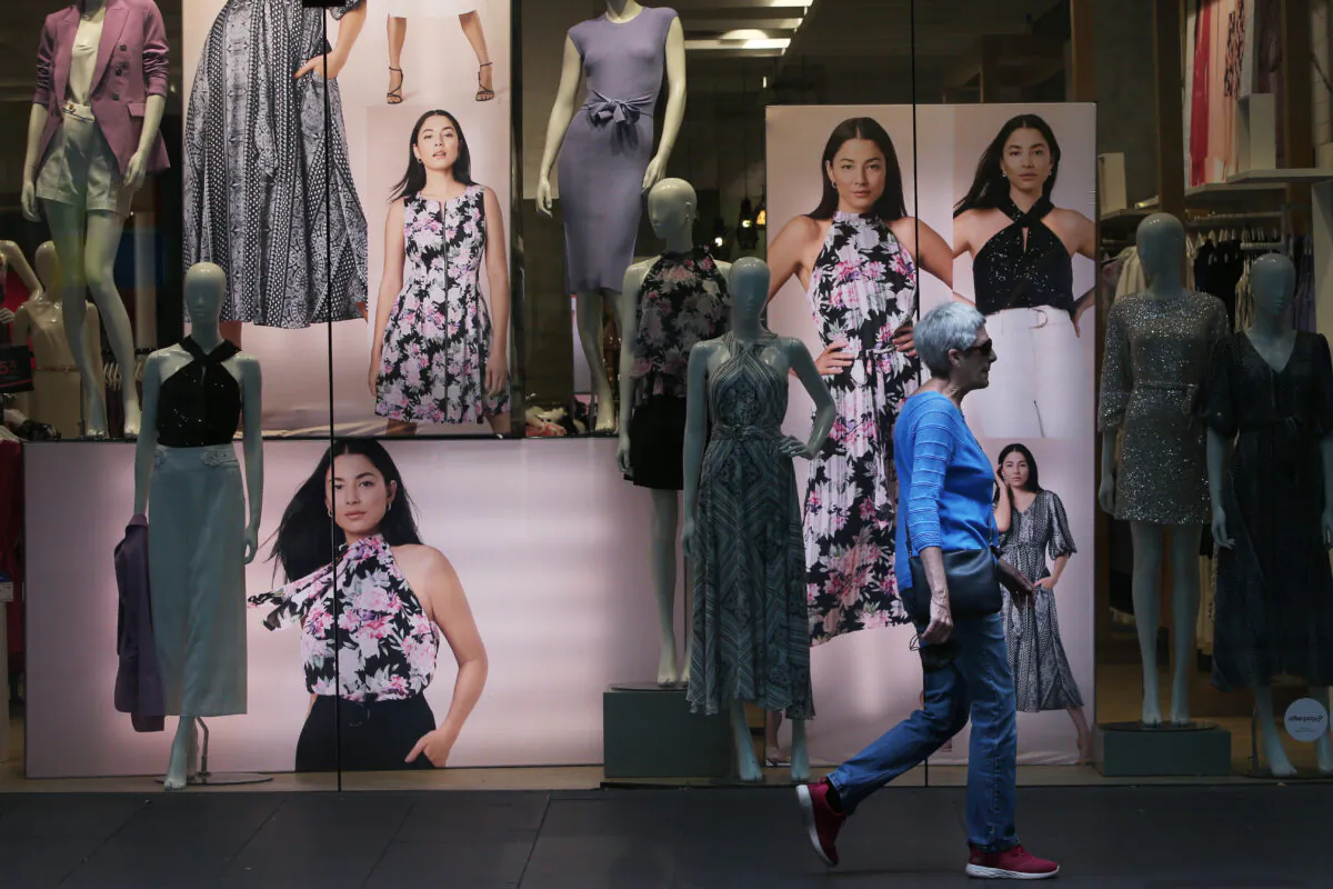 A shopper walks past a retail store in the Pitt Street Mall in Sydney, Australia, on Nov. 8, 2021. (Lisa Maree Williams/Getty Images)