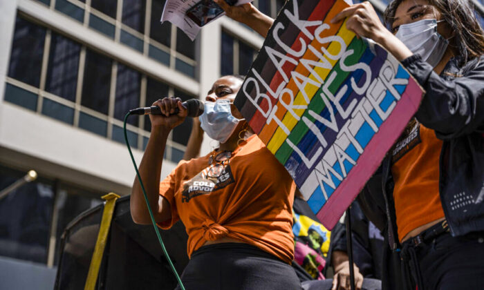 In this file photo, a protest organizer leads chants during a rally on Juneteenth, a holiday to mark the end of slavery, in San Francisco, Calif., on June 19, 2020. (Vivian Lin/AFP via Getty Images)