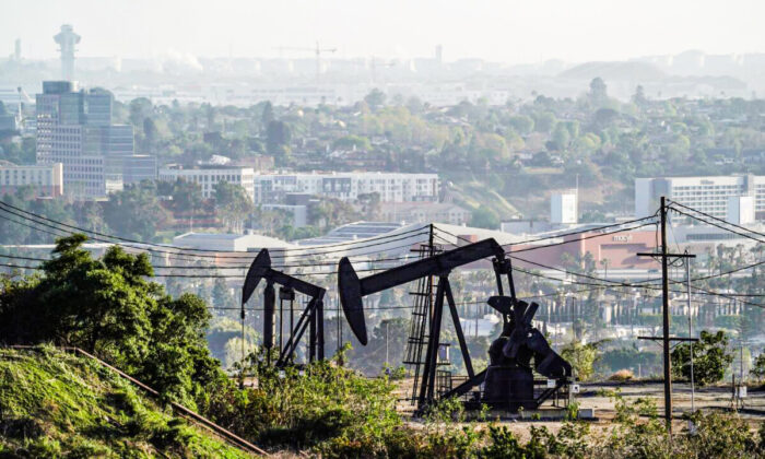 Active pumpjacks from oil wells are pictured at the Inglewood Oil Field, the largest urban oil field in the United States, from the Baldwin Hills Scenic, Overlook in Culver City, Calif., on March 10, 2022. (Bing Guan/Reuters)