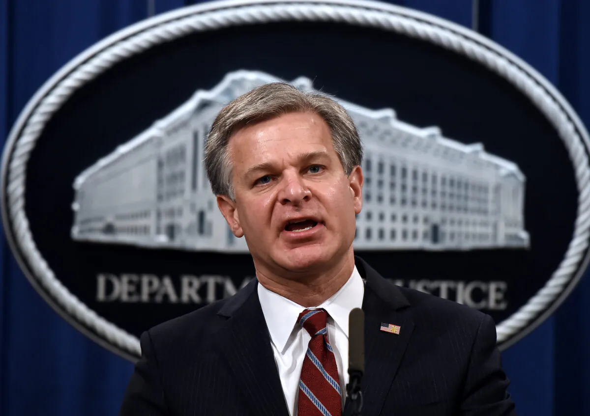FBI Director Christopher Wray during a press conference at the Department of Justice on Sept. 22, 2020. (OLIVIER DOULIERY/POOL/AFP via Getty Images)