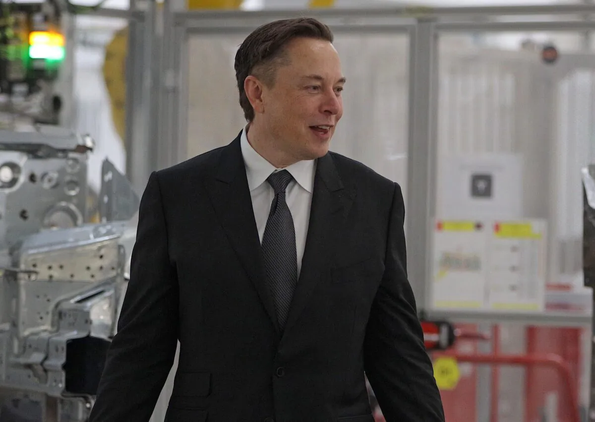 Tesla CEO Elon Musk stands during the official opening of the new Tesla electric car manufacturing plant near Gruenheide, Germany, on March 22, 2022. (Christian Marquardt-Pool/Getty Images)