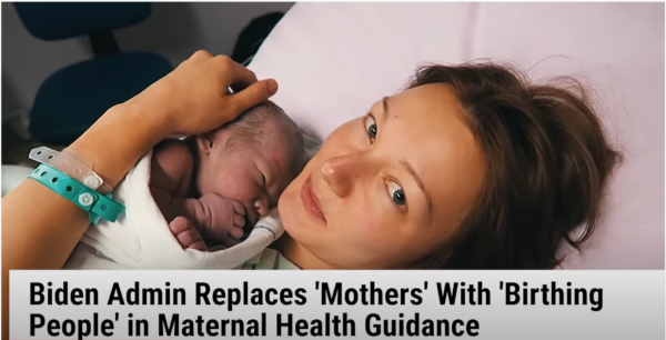Screenshot from the video called "What is a Woman," created by Ilan Srulovicz, proclaiming "Womanhood is a Birthright," showing a mother and her newborn baby. 
