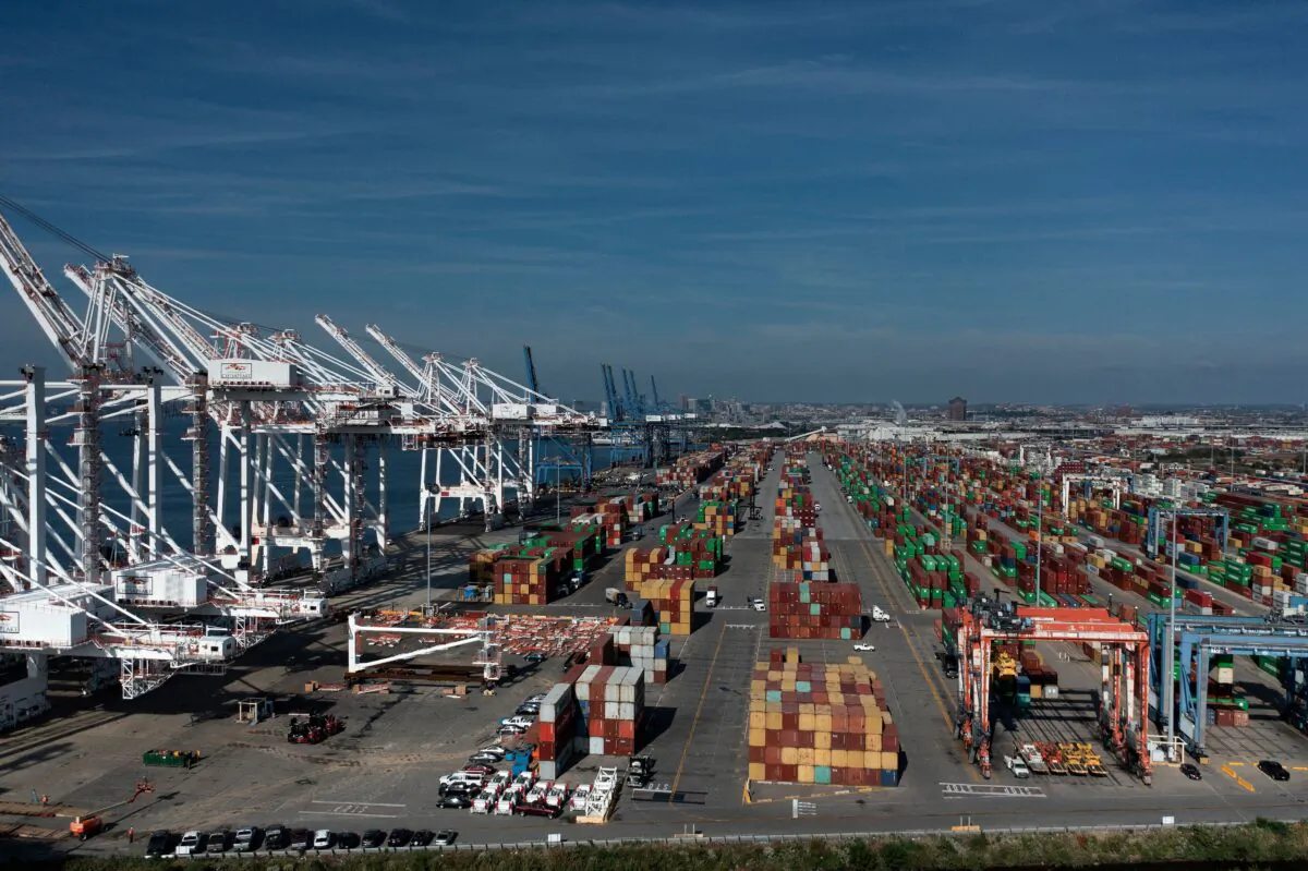 Cargo containers are readied for transport at the Port of Baltimore in Baltimore, Maryland, on October 14, 2021. (Brendan Smialowski/AFP via Getty Images)