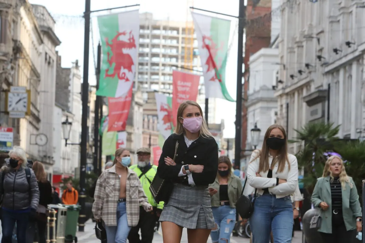 People wearing masks are seen in the centre of Cardiff, Wales, on Oct. 23, 2020. (Geoff Caddick /AFP via Getty Images)