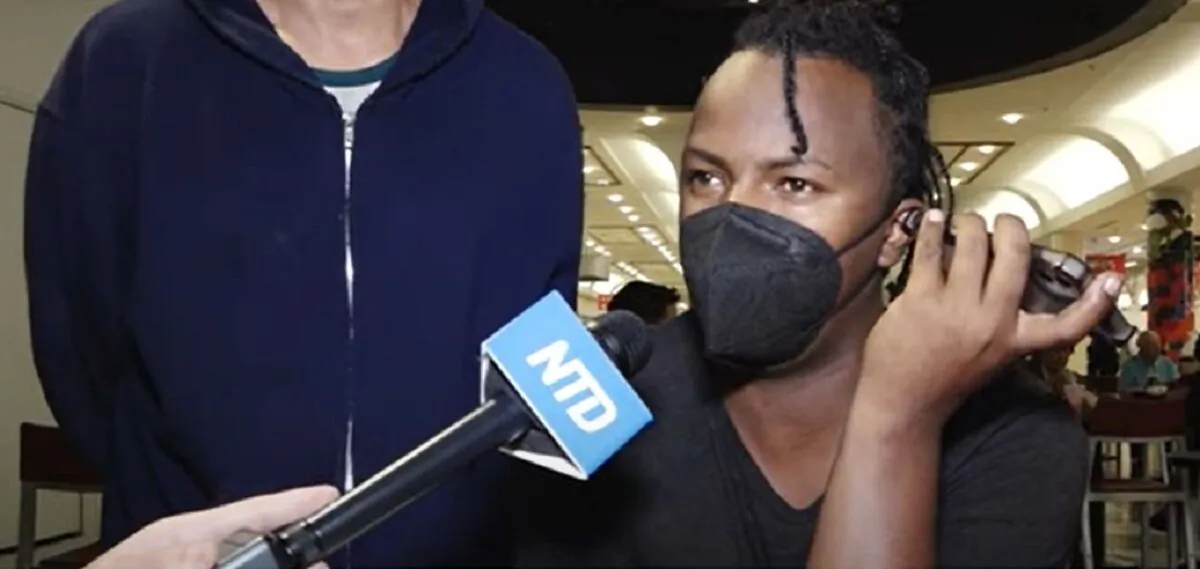 Luis Alberto, one of the illegal immigrants who took a bus from Texas to Washington, speaks to a reporter in Union Station on April 13, 2022. (NTD Television)