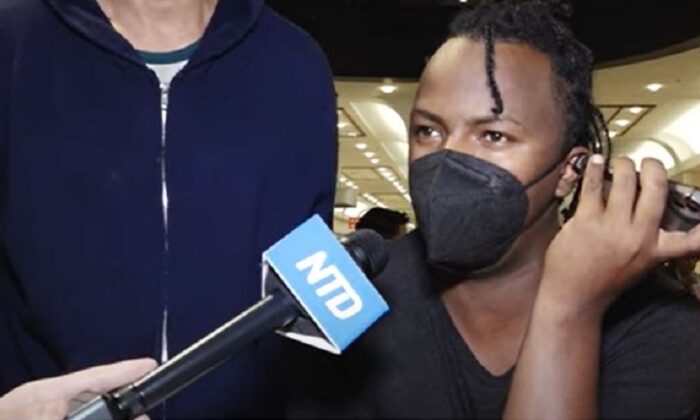 Luis Alberto, one of the illegal immigrants who took a bus from Texas to Washington, speaks to a reporter in Union Station on April 13, 2022. (NTD Television)
