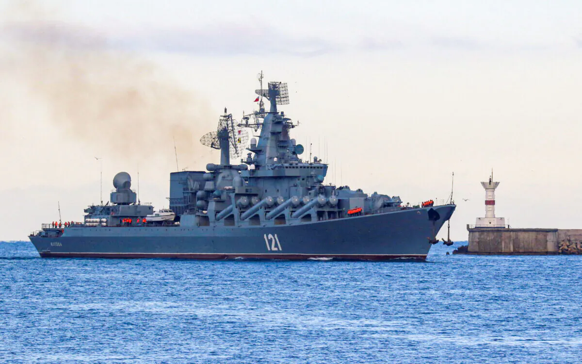 The Russian Navy's guided missile cruiser Moskva sails back into a harbor in the port of Sevastopol, Crimea, on Nov. 16, 2021. (Alexey Pavlishak/Reuters)