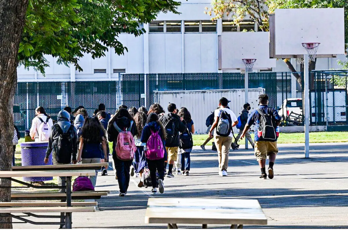 Students walk to their classrooms at a public middle school in Los Angeles, on Sept. 10, 2021. (Robyn Beck/AFP via Getty Images)