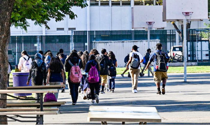 Students walk to their classrooms at a public middle school in Los Angeles, on Sept. 10, 2021. (Robyn Beck/AFP via Getty Images)