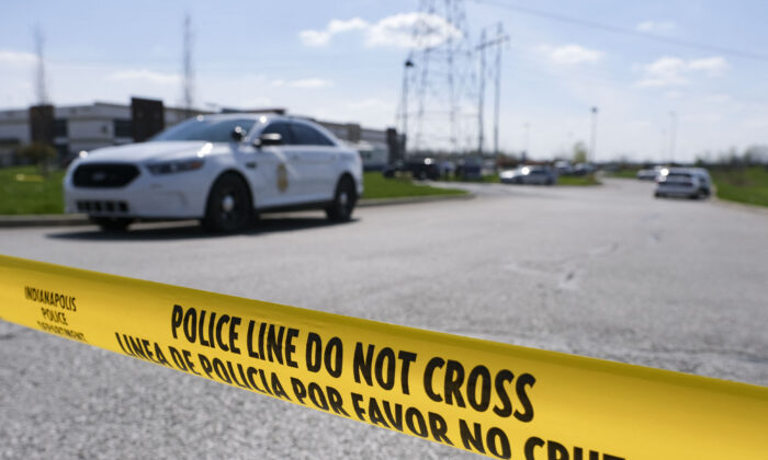 Police caution tape blocks the entrance to a shooting site in Indianapolis, on April 16, 2021. (Jeff Dean/AFP via Getty Images)