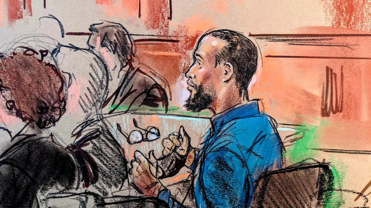In this courtroom sketch, El Shafee Elsheikh, a former British national, convicted of taking hostages and conspiracy to murder U.S. citizens by a U.S. jury, sits in federal court in Alexandria, Va., on April 1, 2022. (Bill Hennessy/Reuters)