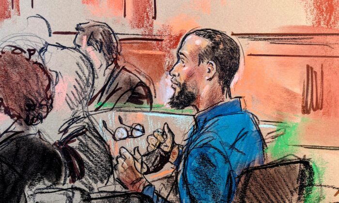 In this courtroom sketch, El Shafee Elsheikh, a former British national, convicted of taking hostages and conspiracy to murder U.S. citizens by a U.S. jury, sits in federal court in Alexandria, Va., on April 1, 2022. (Bill Hennessy/Reuters)