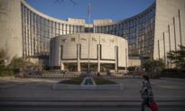 China’s Central Bank Cuts Rates to Boost Economy