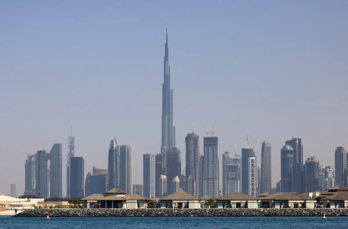 This picture taken from the sea of Dubai on March 3, 2021 shows the skyline of the Gulf emirate with Burj Khalifa in the centre. (Photo by GIUSEPPE CACACE / AFP) (Photo by GIUSEPPE CACACE/AFP via Getty Images)