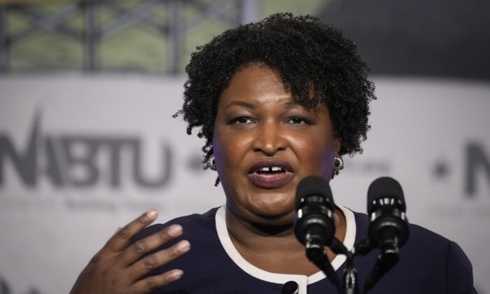 Georgia Democratic gubernatorial candidate Stacey Abrams wants to change the state's course if elected. Here she speaks in Washington on April 6, 2022. (Drew Angerer/Getty Images)
