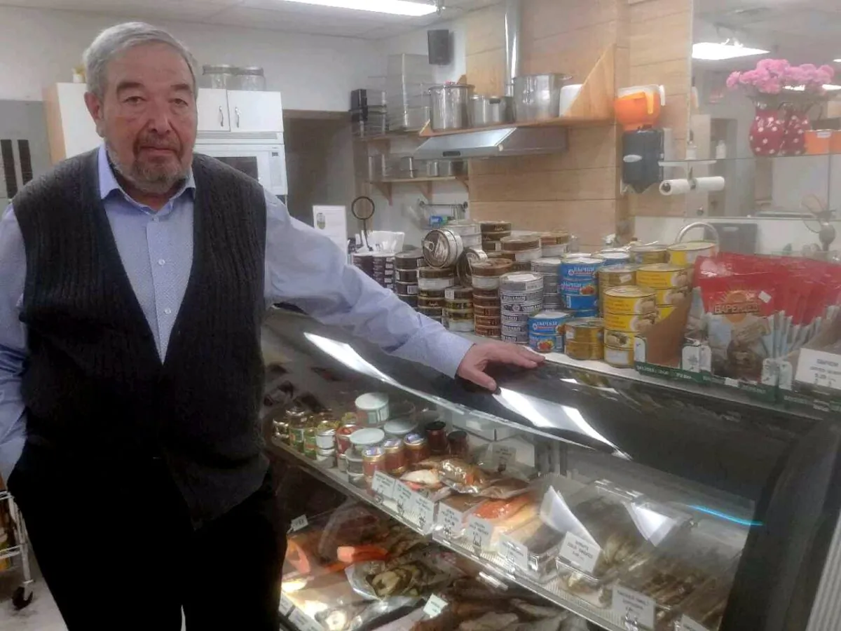 Grigori Khaskin, owner of Euro Food Tri-City in Coquitlam, B.C., at his store. (Jeff Sandes/The Epoch Times)